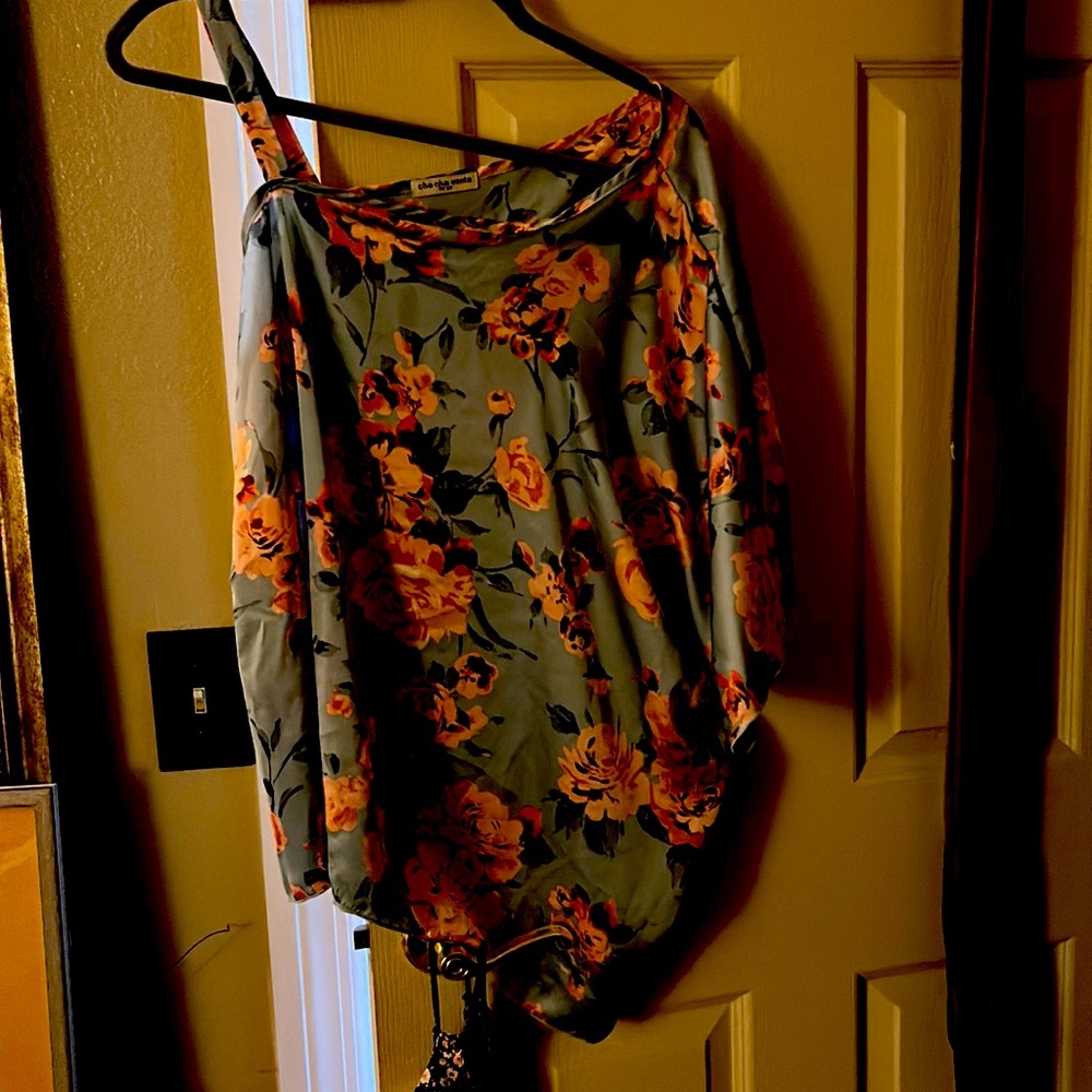 Teal and Pink Floral print blouse with a right shoulder open held with strap